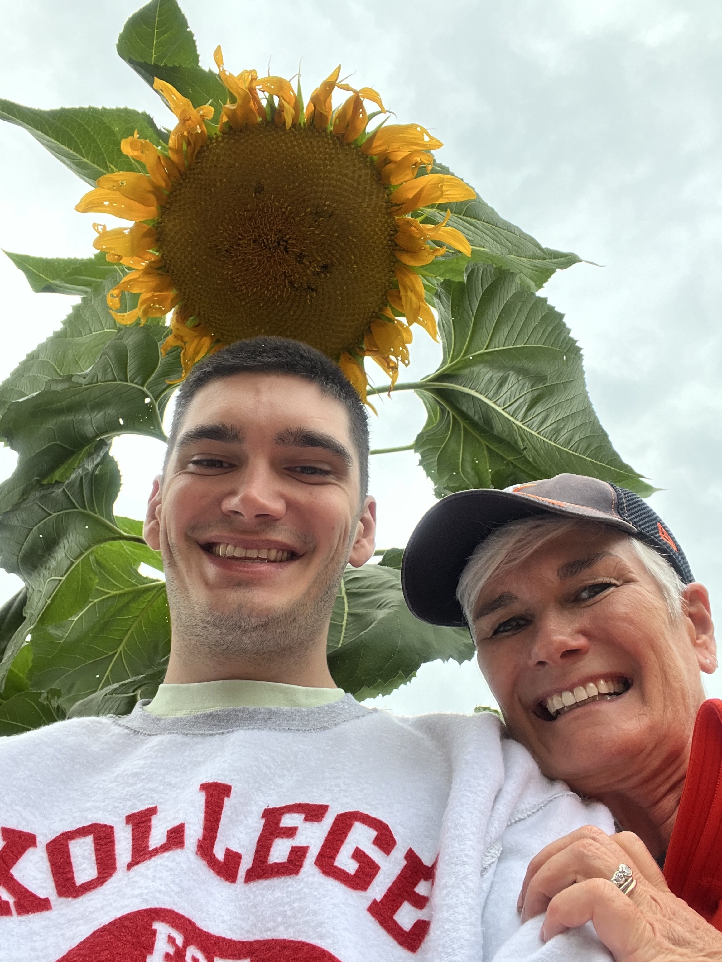 Mom gloating about her huge sunflowers